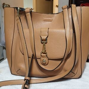 Calvin Klein unlined tote bag with removable crossbody strap.